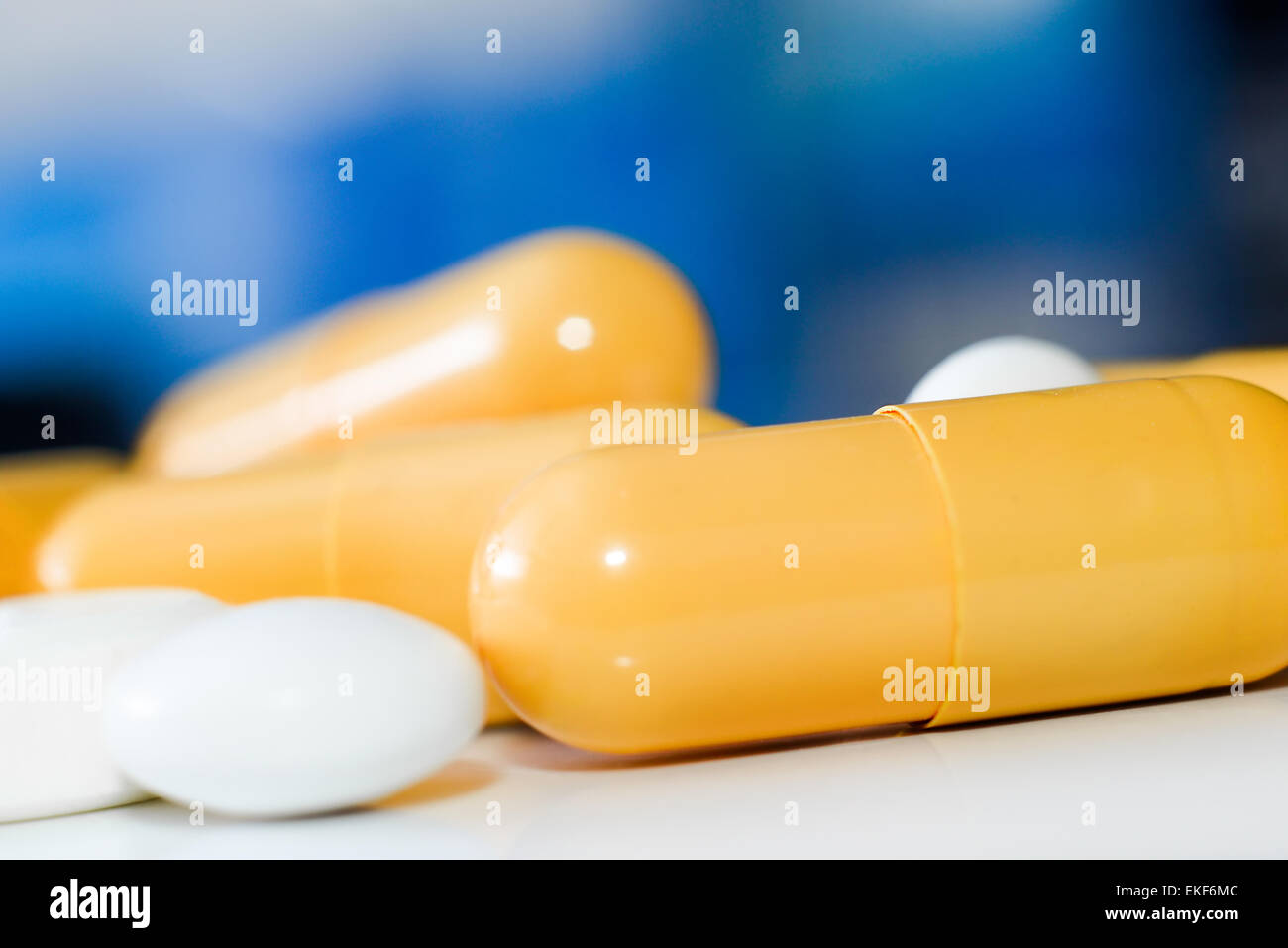 yellow and white  pills Stock Photo