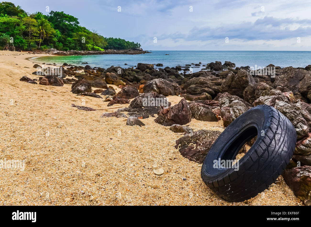 Washed out tyre at beautiful ocean coast in Andaman sea Stock Photo