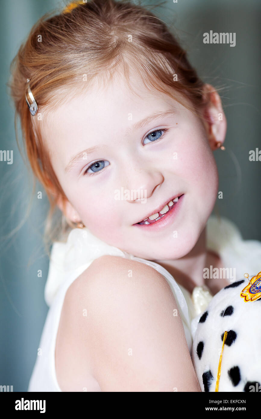 portrait of a beautiful little girl with a toy dog Stock Photo - Alamy