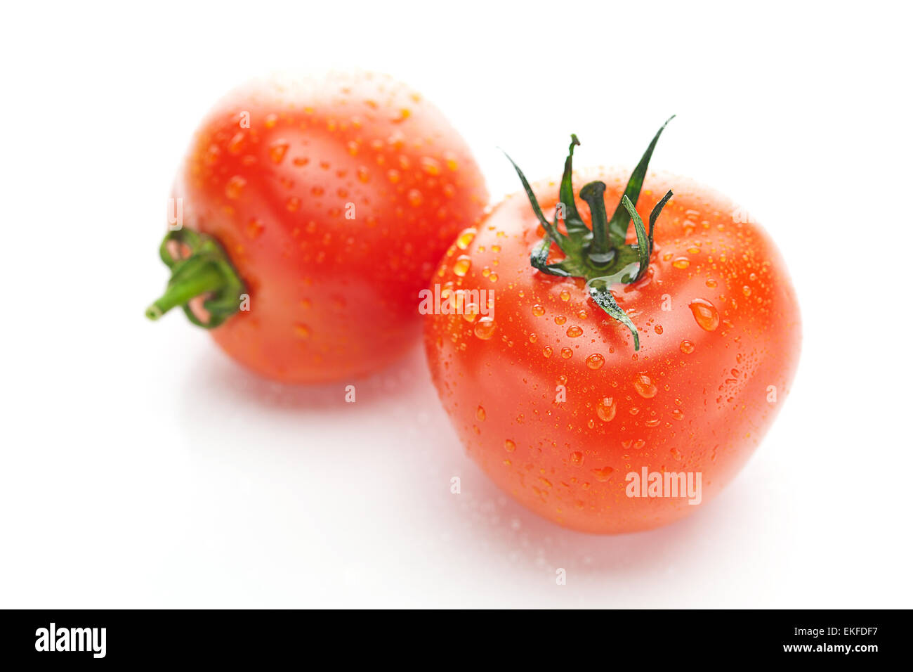 tomato with water drops isolated on white Stock Photo - Alamy