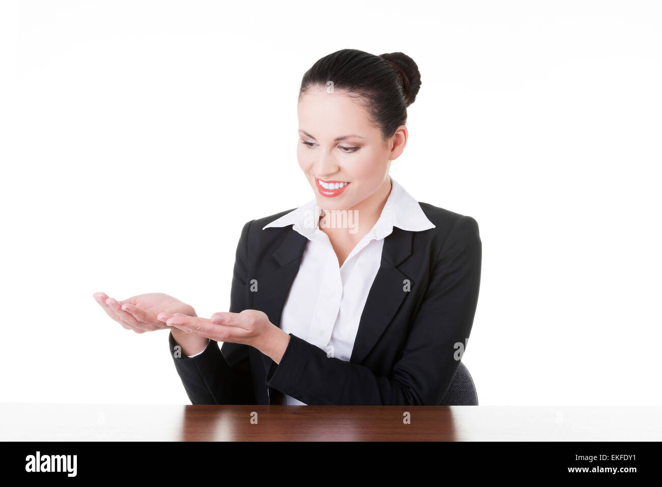 Business woman showing copy space on her palm Stock Photo - Alamy
