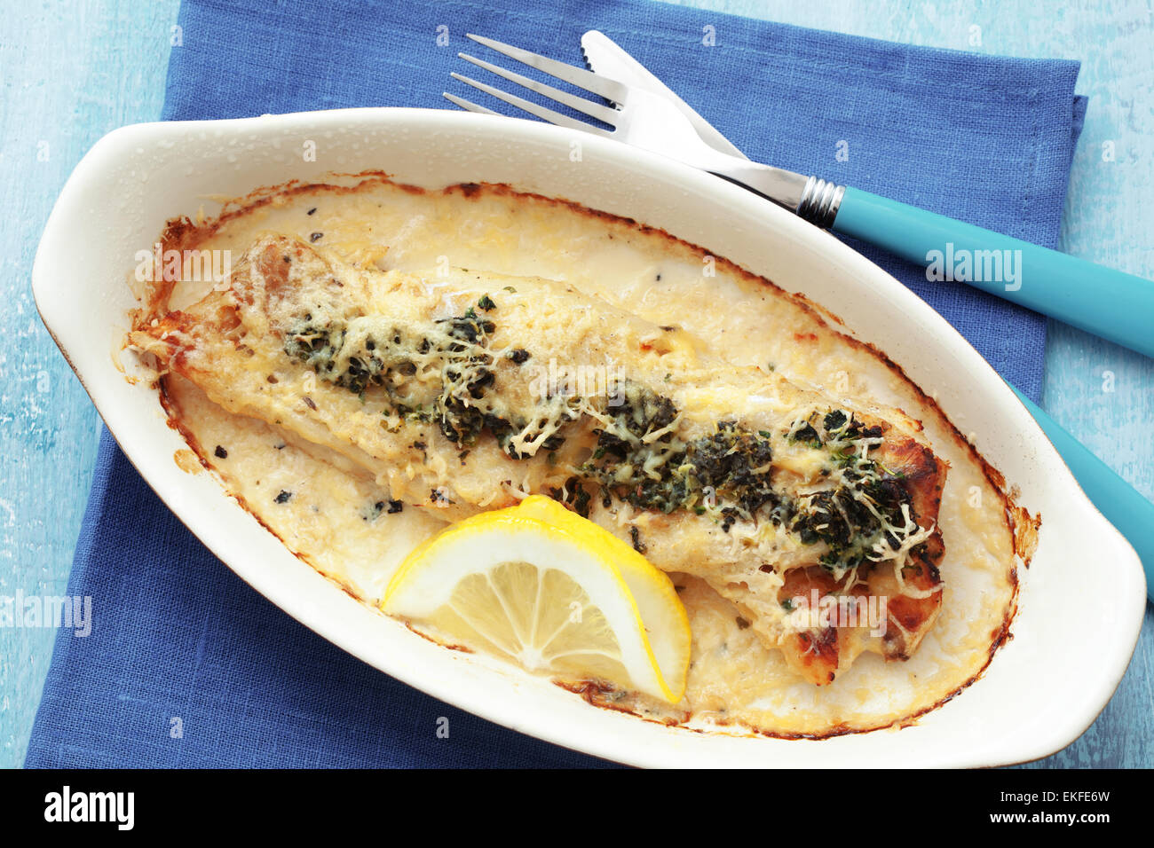 Cooked fish with spinach Stock Photo Alamy
