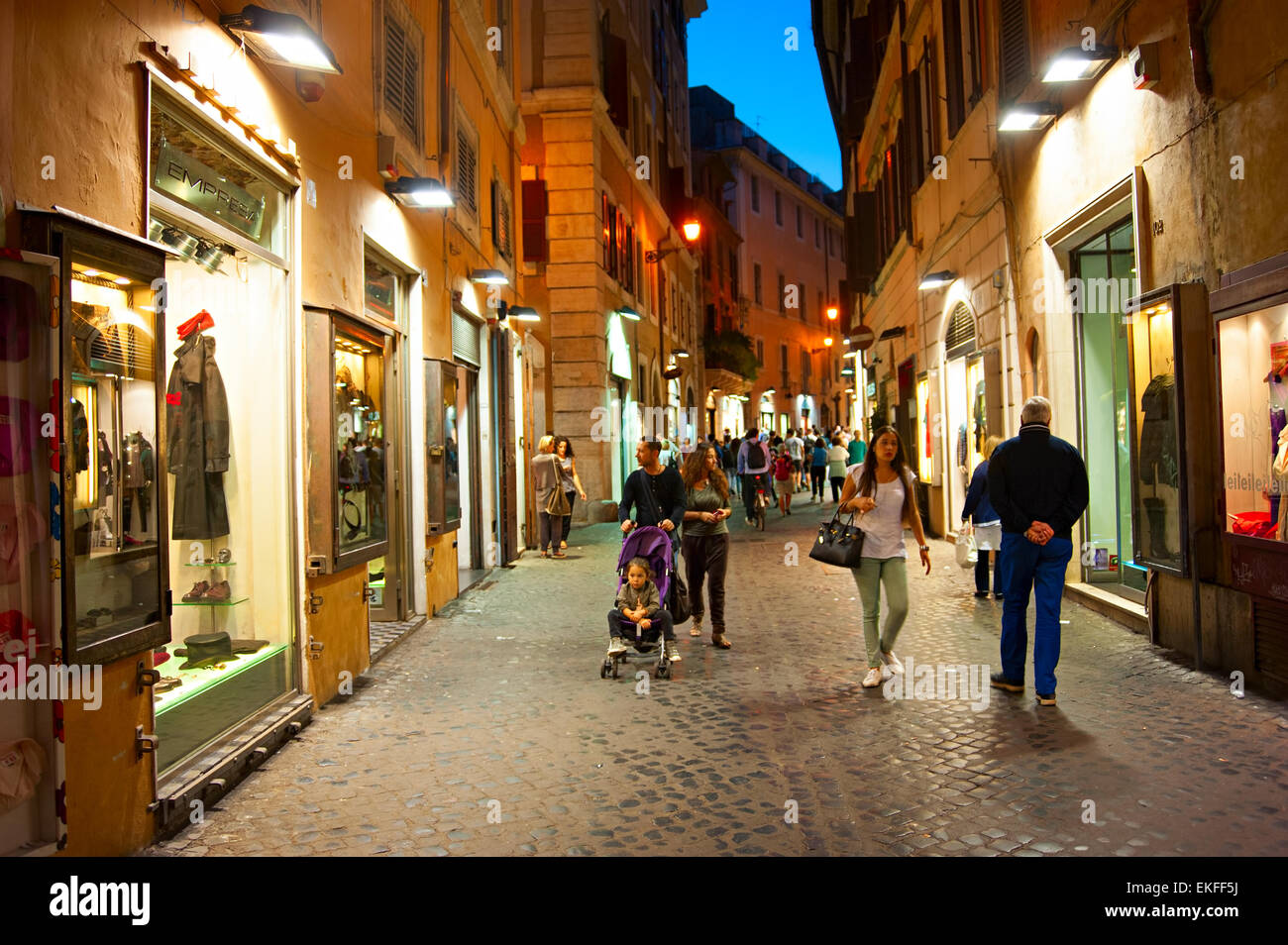 Tourists walking on the Old Town street of Rome. More than 6 million of international tourists visi Stock Photo