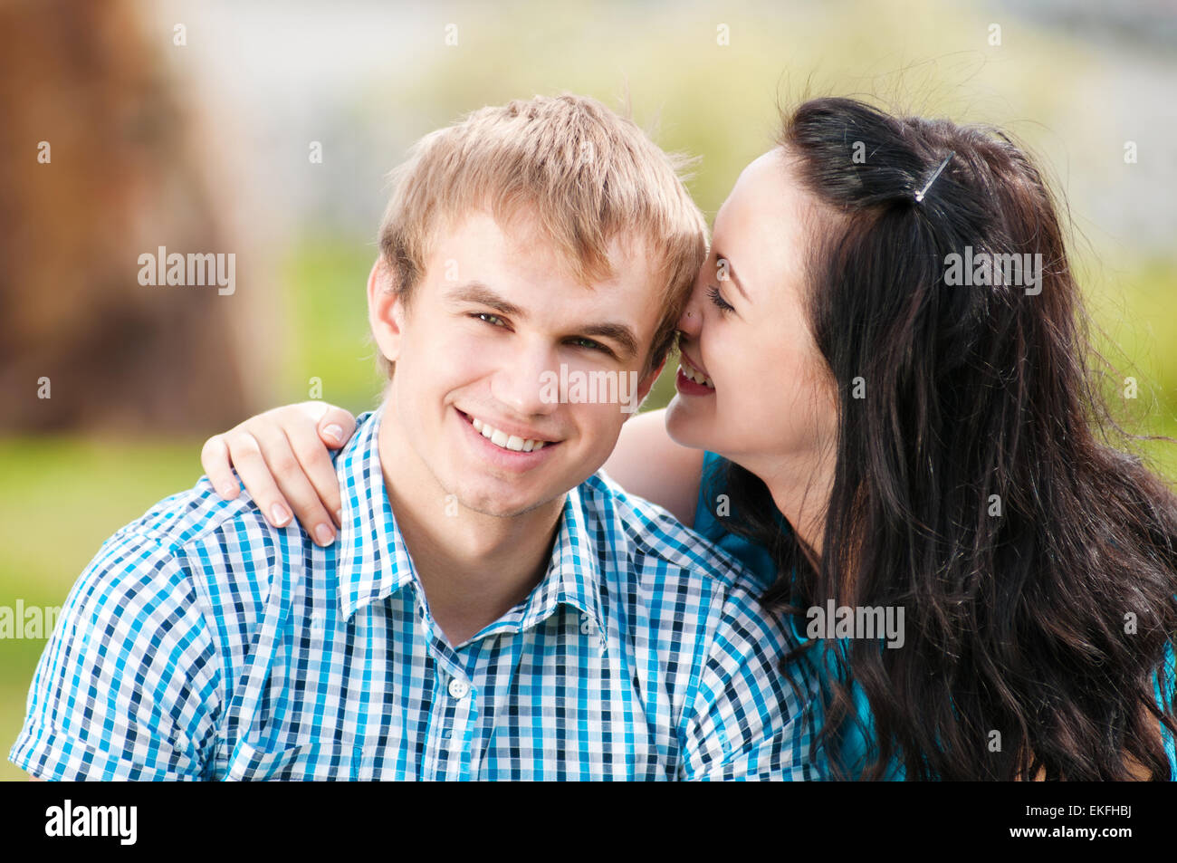 Portrait of a beautiful young happy smiling couple Stock Photo - Alamy