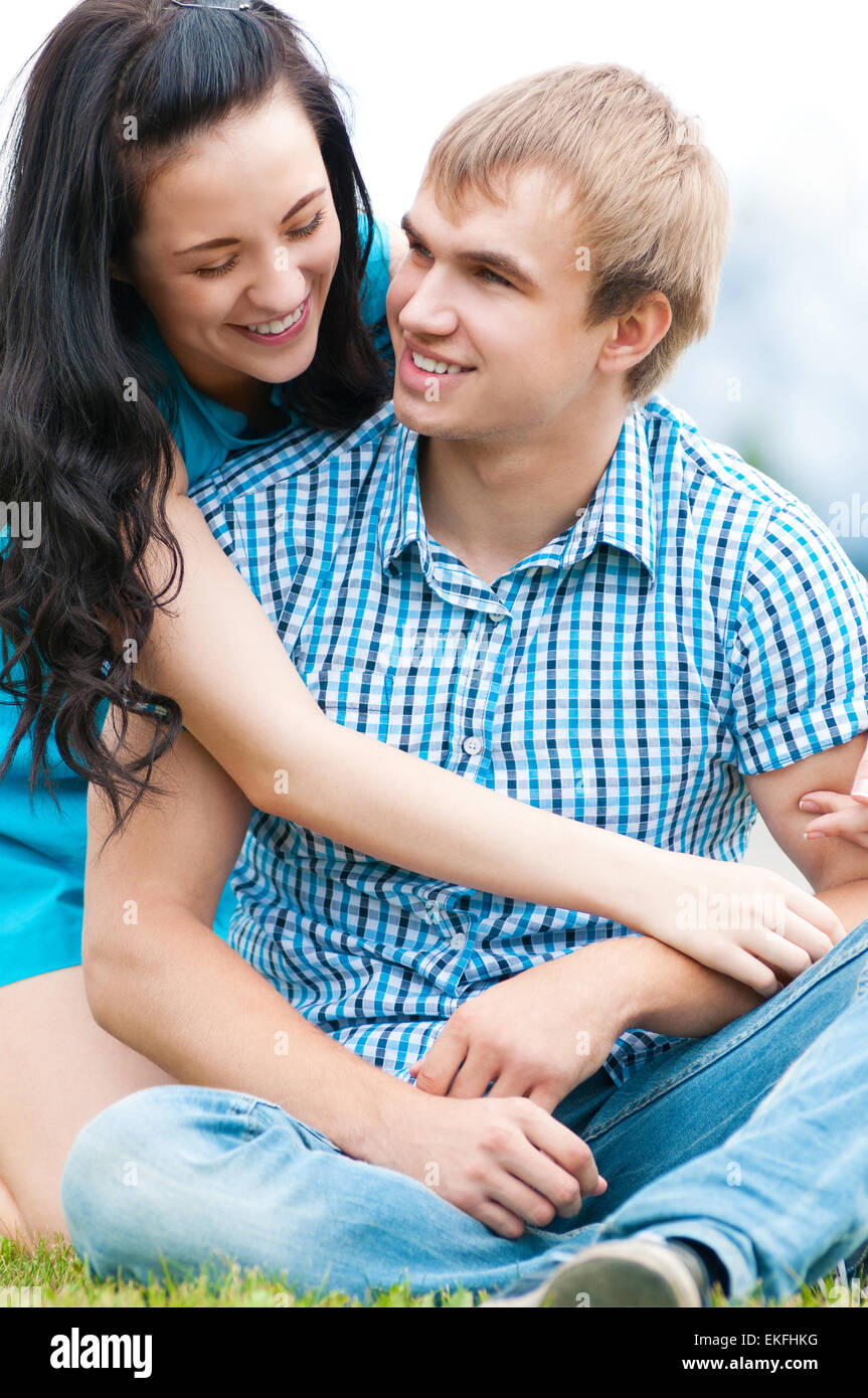 Portrait of a beautiful young happy smiling couple Stock Photo - Alamy