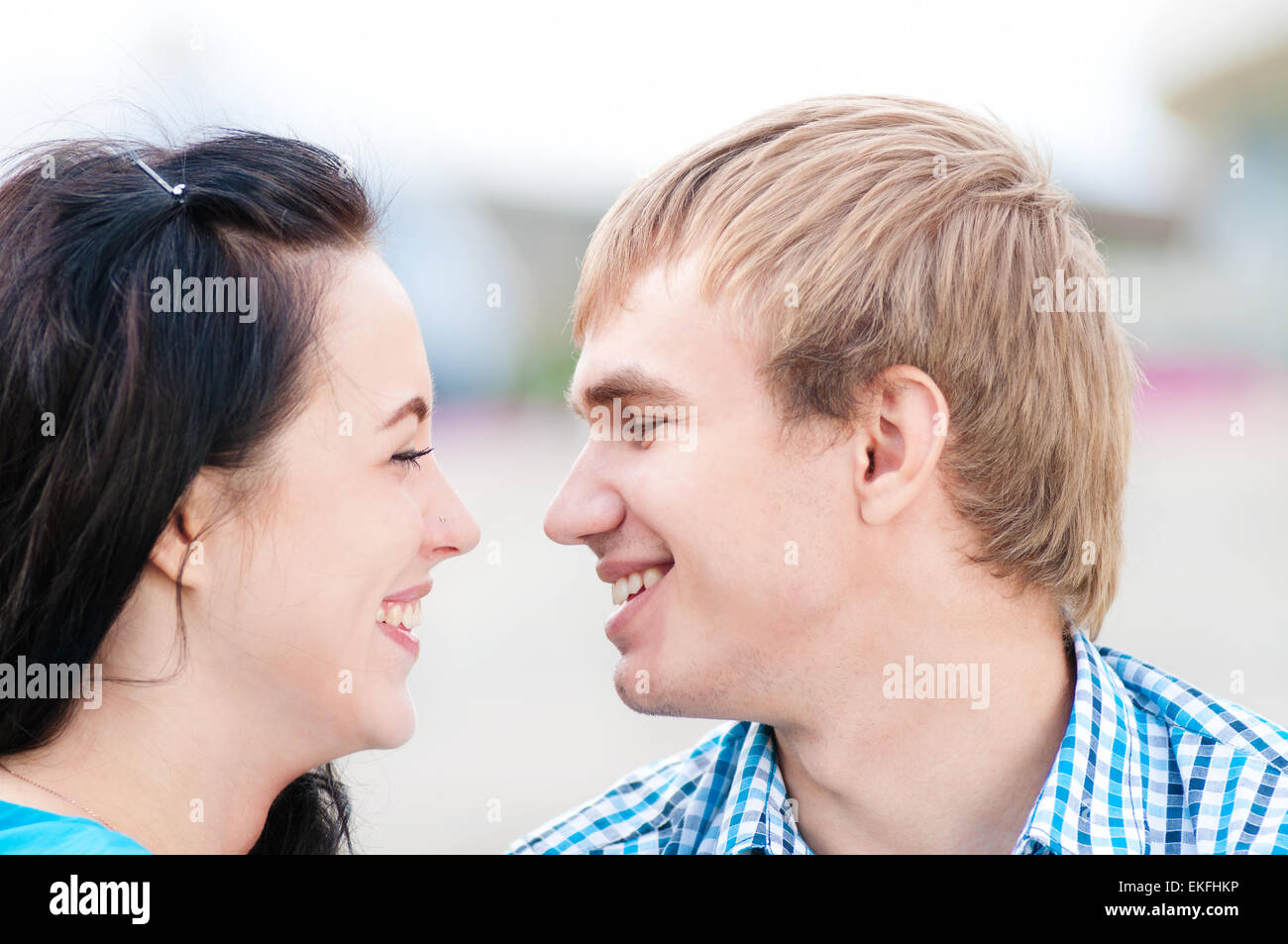 Portrait of a beautiful young happy smiling couple Stock Photo - Alamy