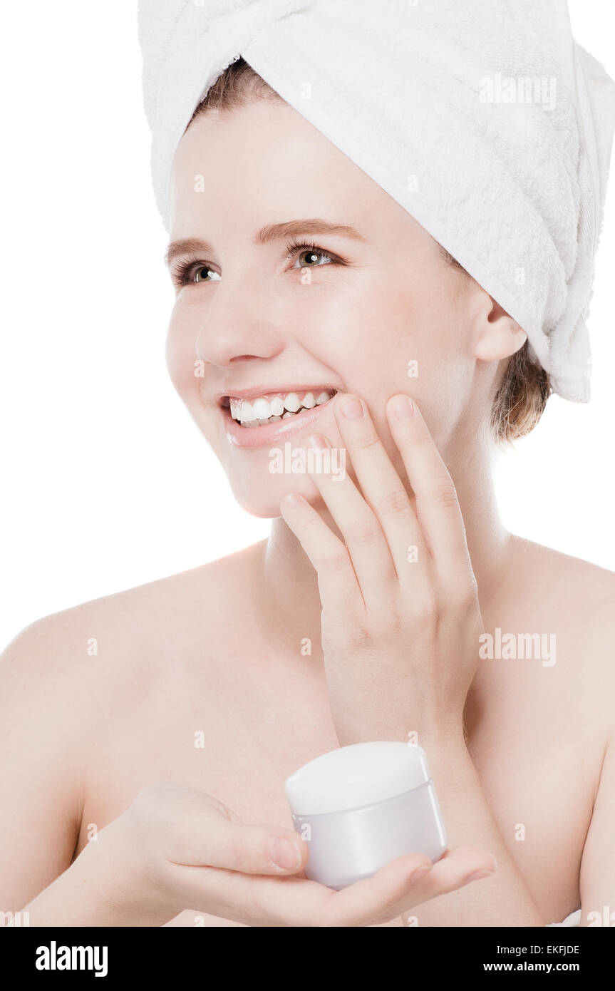 Woman applying moisturizer cream on face Stock Photo Alamy