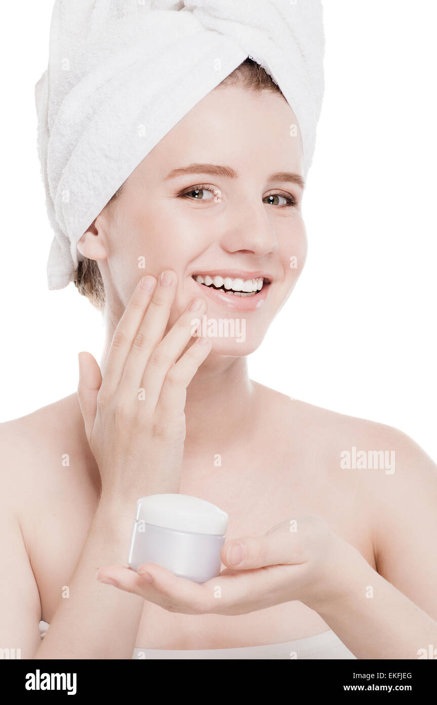 Woman Applying Moisturizer Cream On Face Stock Photo Alamy