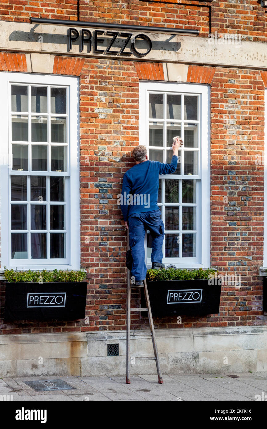 Man On A Ladder Stock Photo - Download Image Now - Ladder, Window Washer,  Danger - iStock