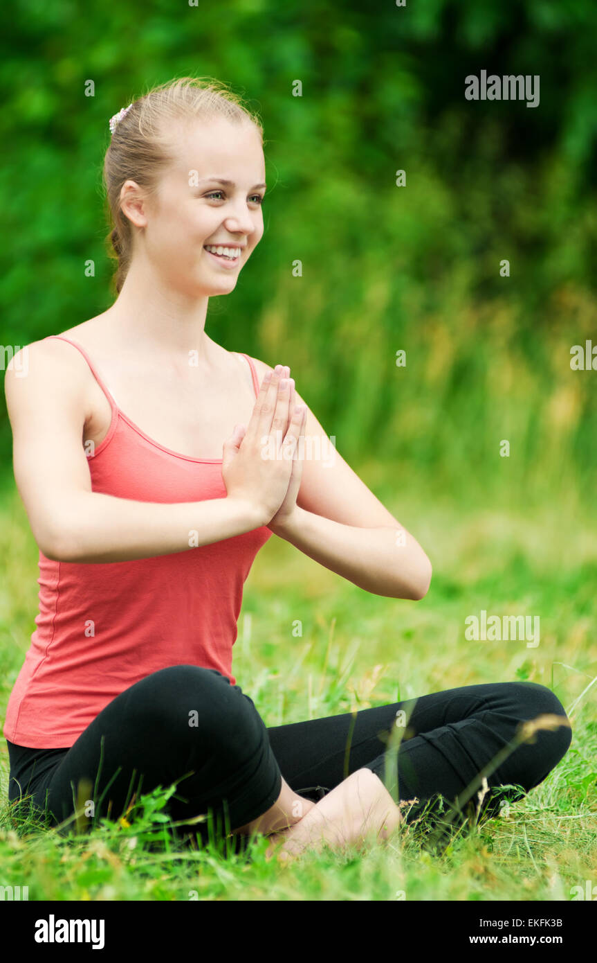 Young athlete doing leg exercise hi-res stock photography and images ...
