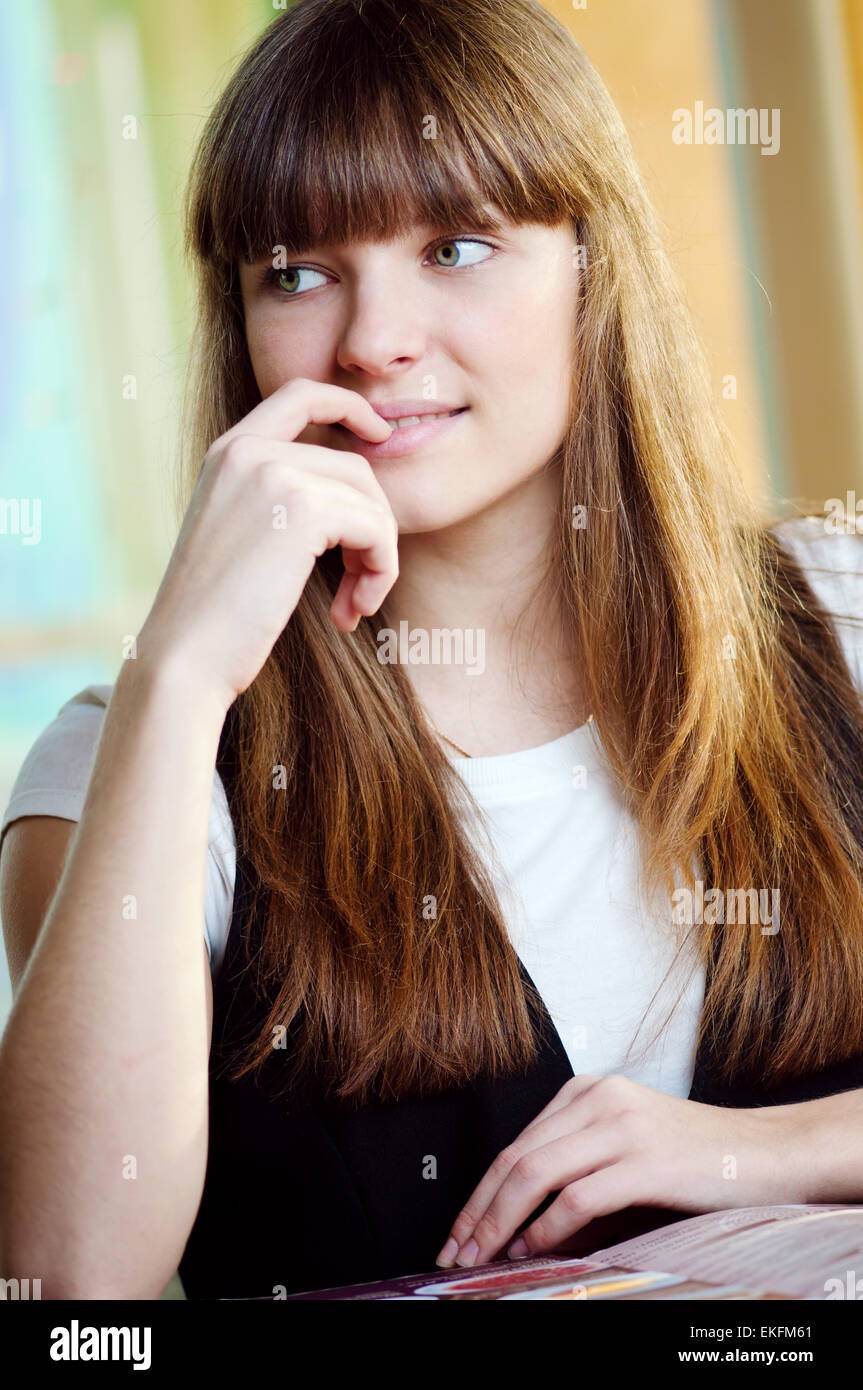 A young woman in a cafe Stock Photo - Alamy