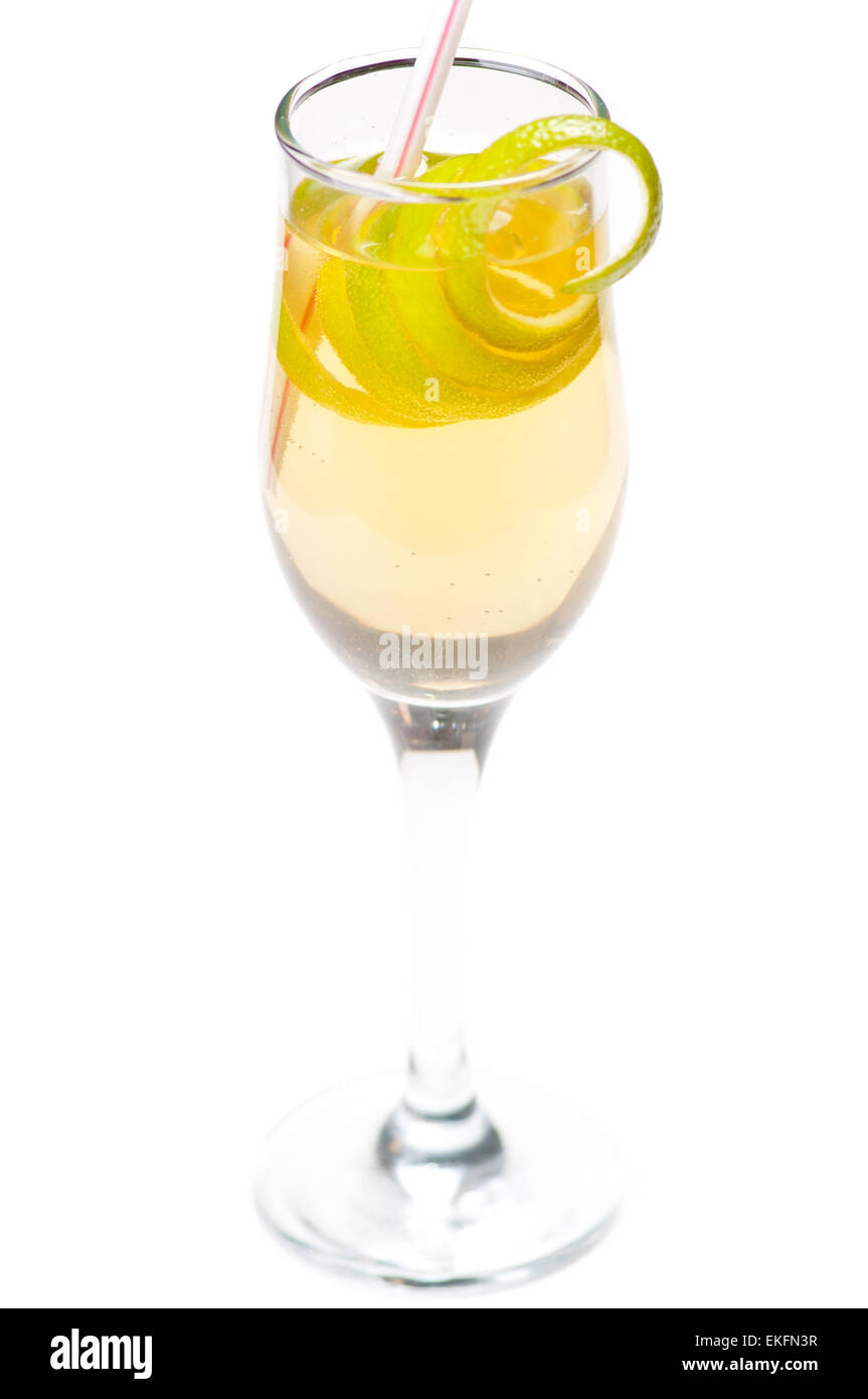 Yellow cocktail in glass with lemon twist Stock Photo