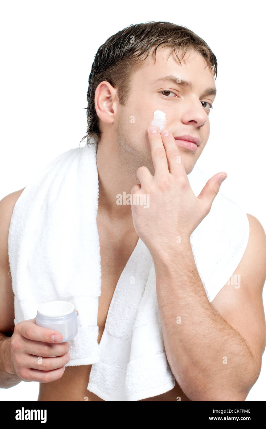 Man putting on cream lotion on face Stock Photo Alamy