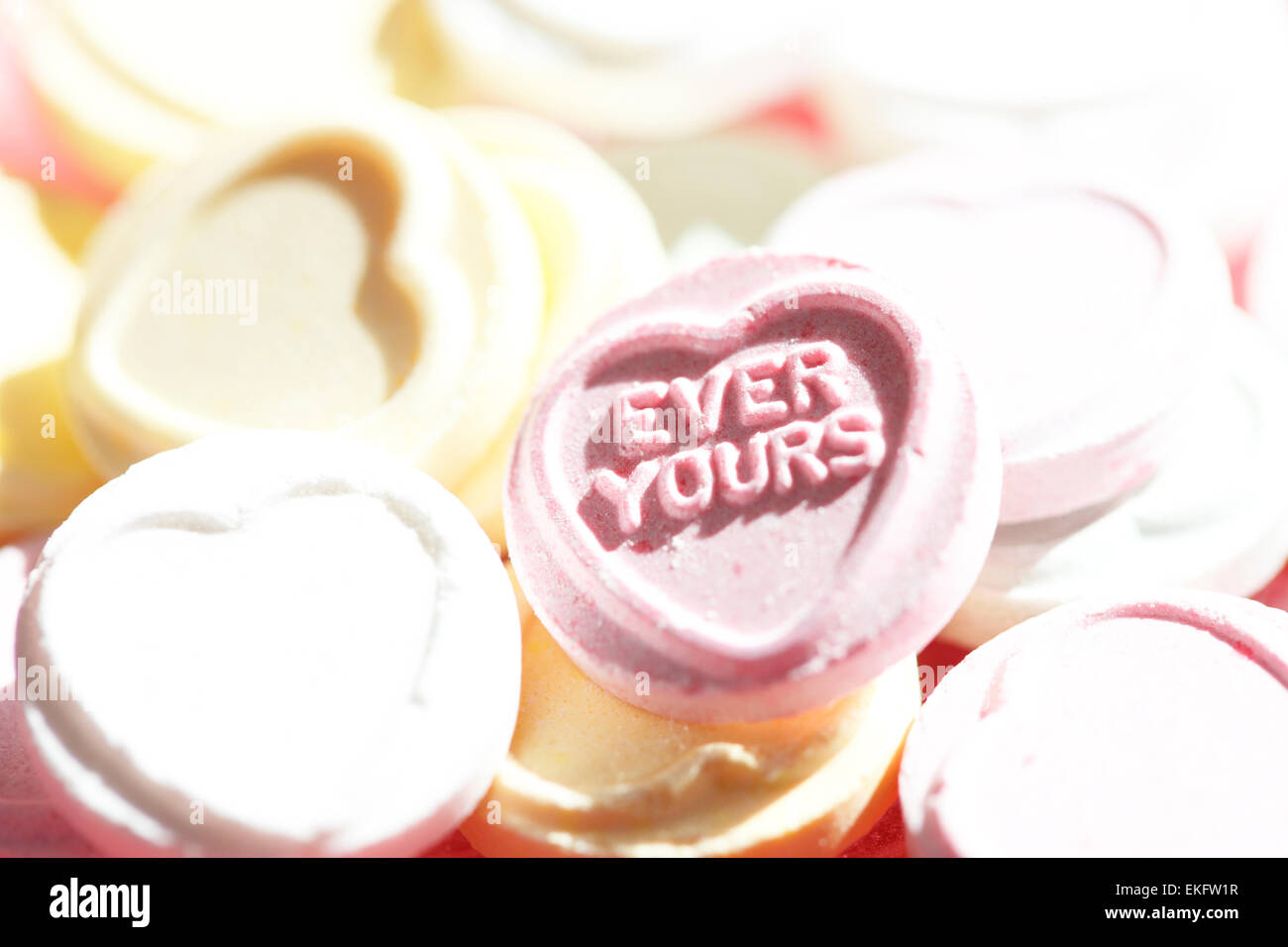 love heart sweets, sunny, bright, romantic candies Jane Ann Butler Photography JABPSW030 Stock Photo