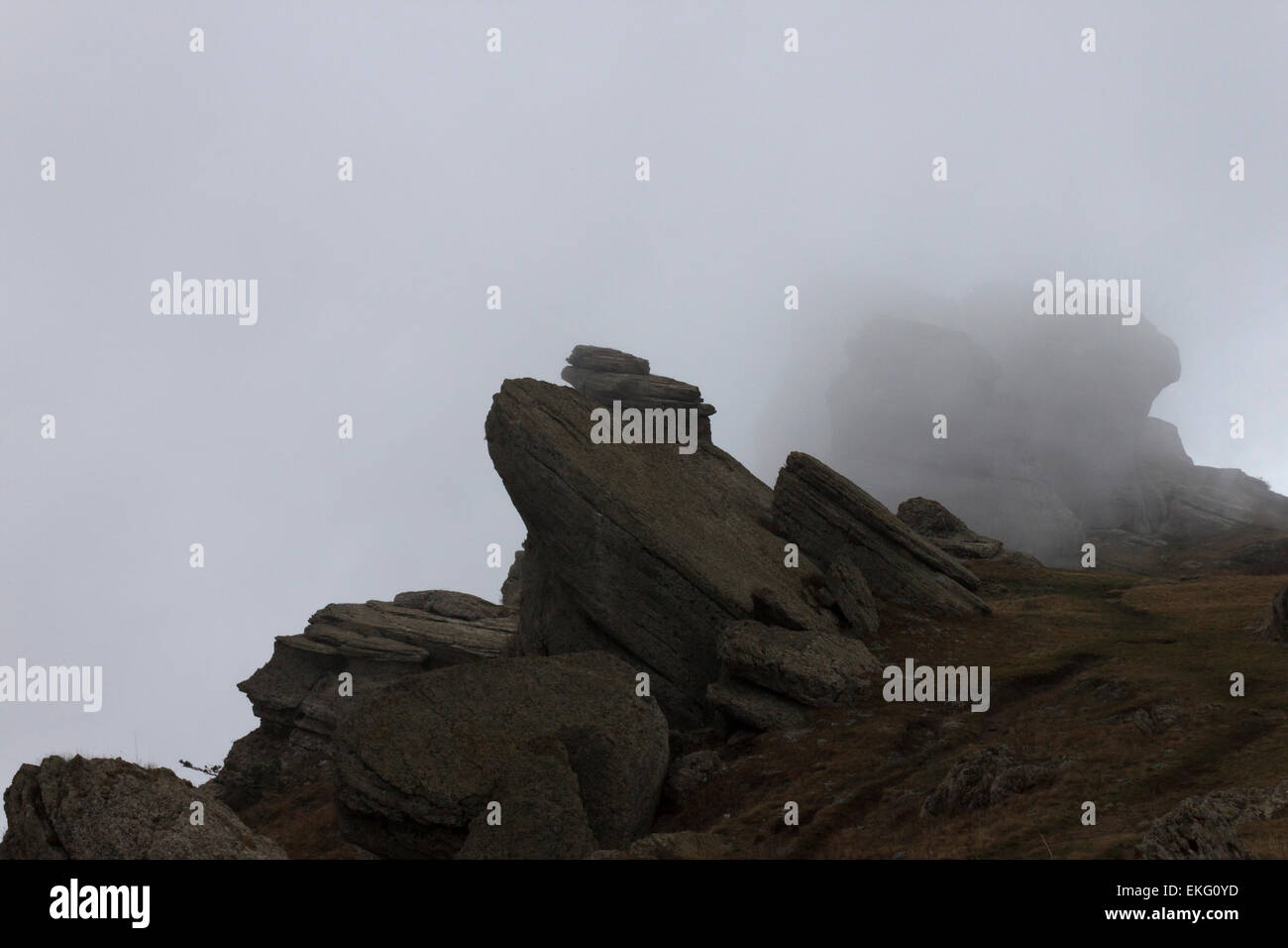 rocks on mountain in cloud Stock Photo