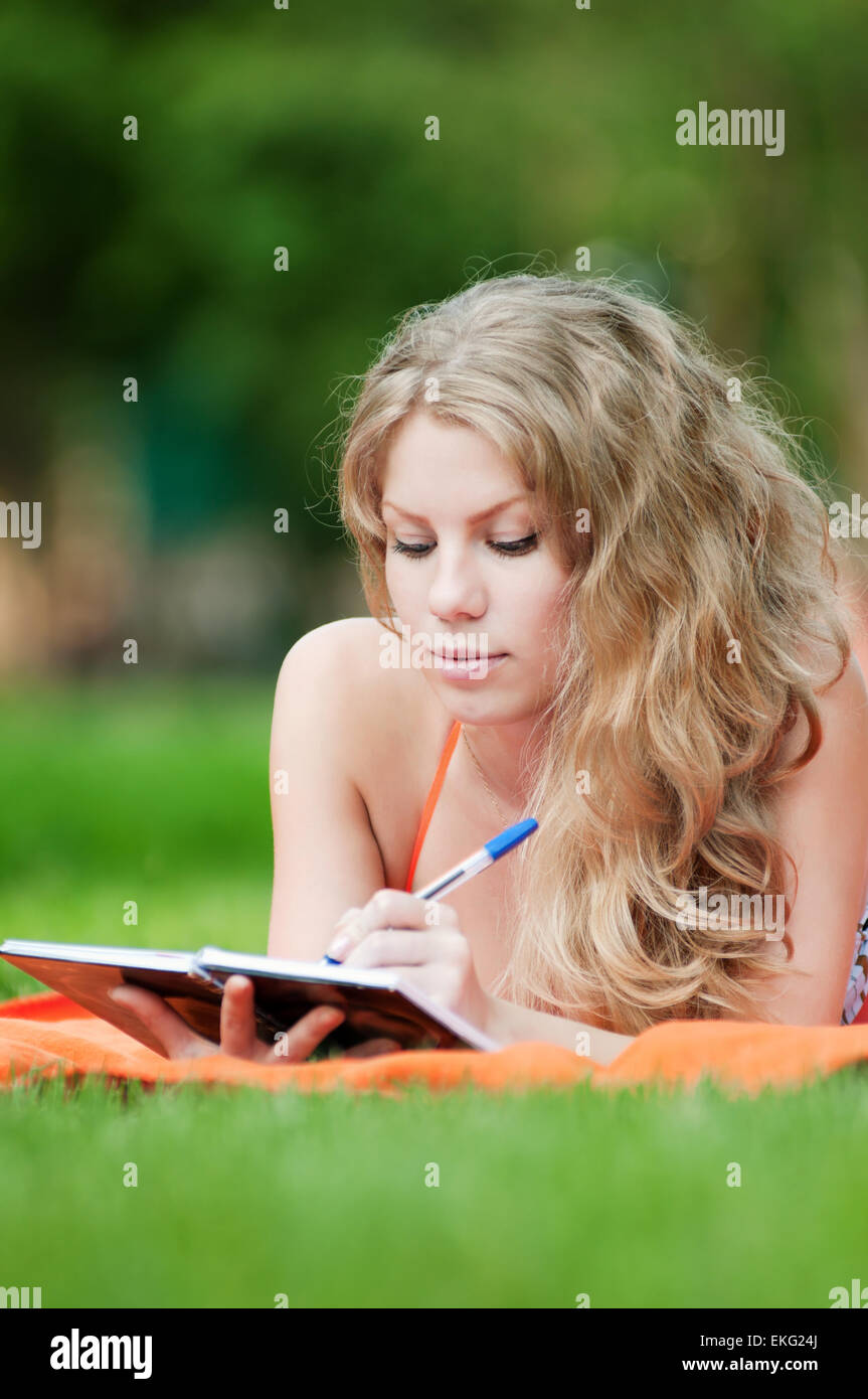 Beautiful young woman study Stock Photo - Alamy