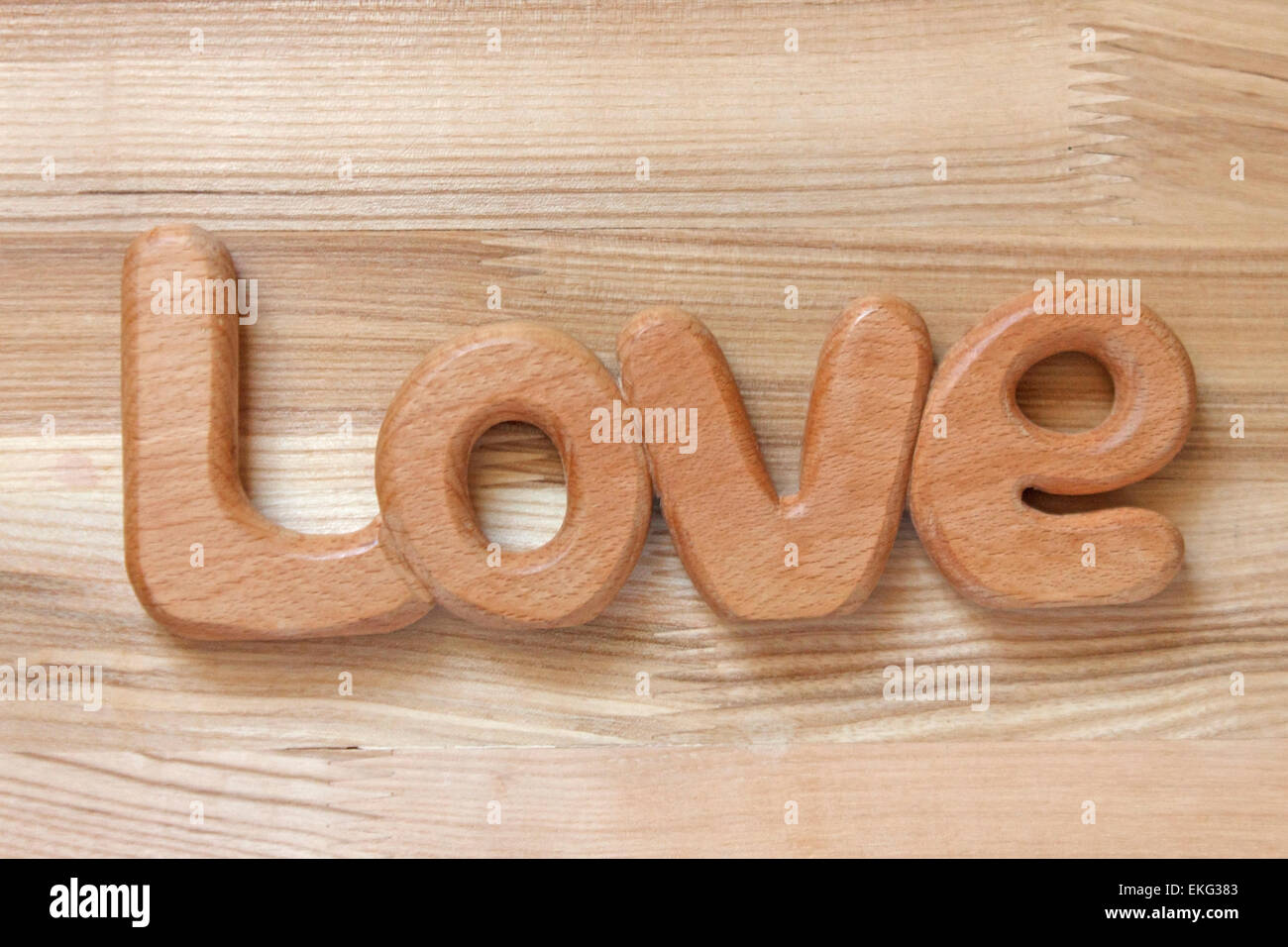 word love on wooden background Stock Photo