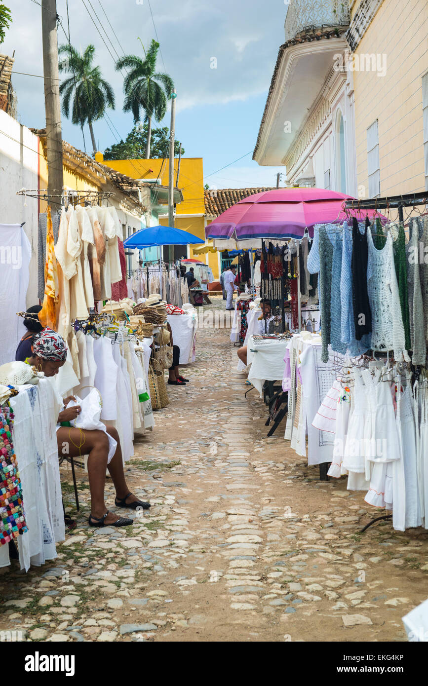Cuba Trinidad cobbled street arts craft handicrafts market stall woven