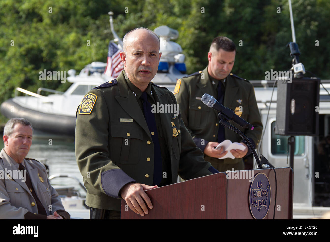 082913: U.S. Customs and Border Protection in honor and remembrance of fallen Border Patrol Agent Brian A. Terry held a CBP Vessel Dedication ceremony at the Elizabeth Park Marina, Trenton, MI. Chief Patrol Agent Detroit Sector Mario Martinez speaks to the audience at the ceremony.  Donna Burton Stock Photo