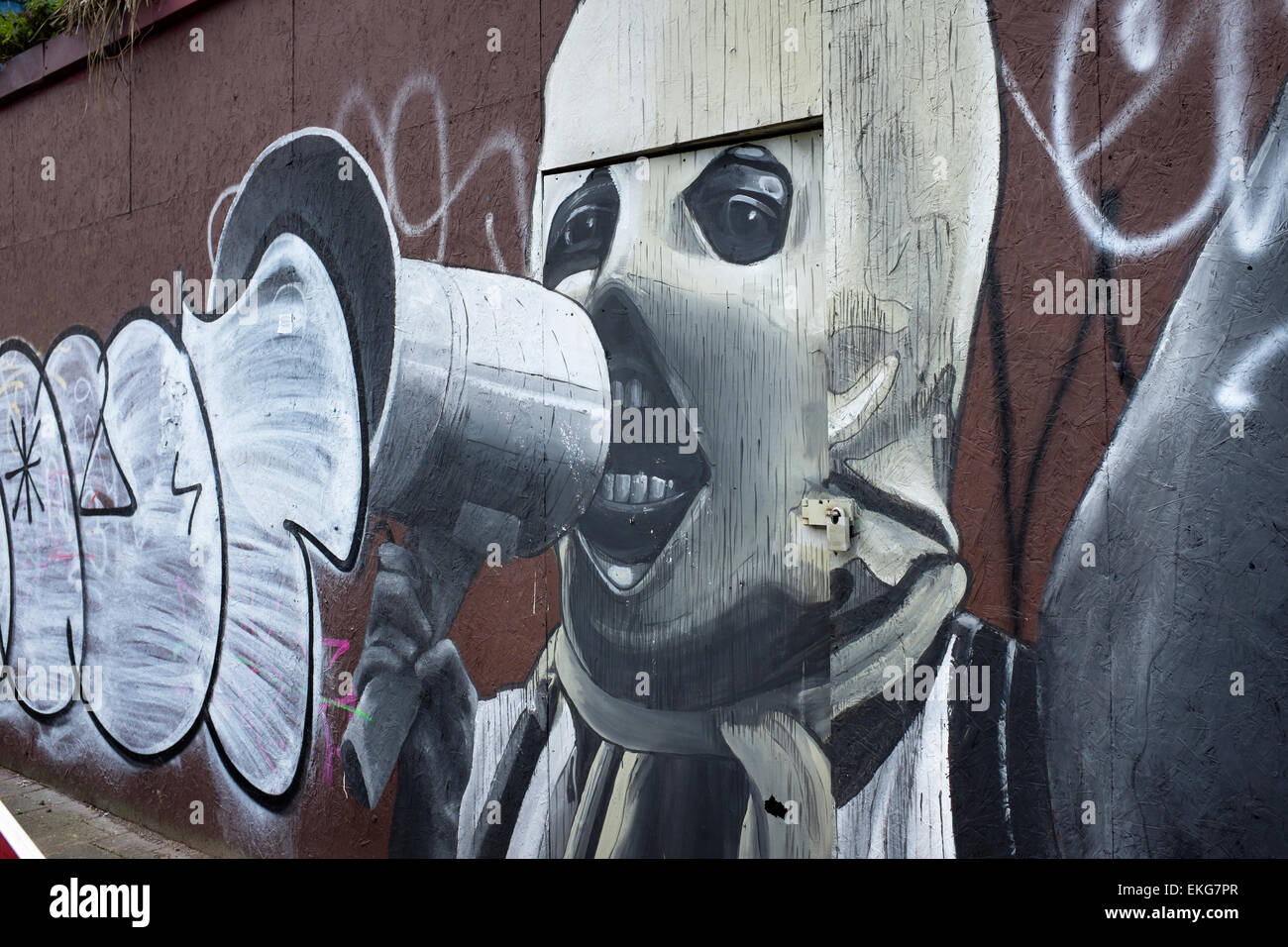 Urban Street Art Graffiti in City Road in Cardiff Stock Photo