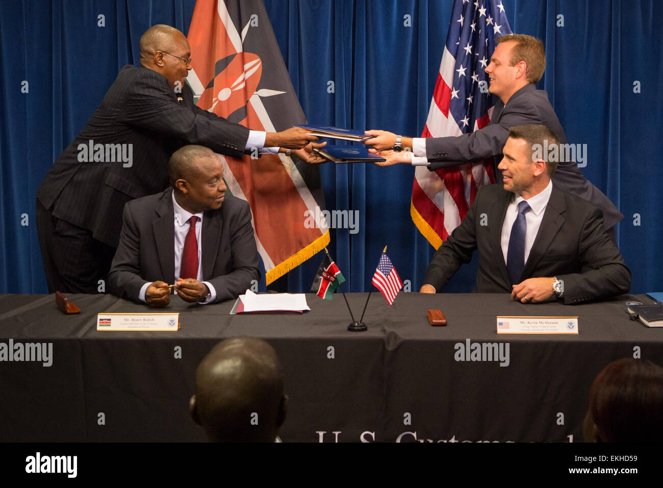 Mr. Henry Rotich, Cabinet Member of the Treasury, Republic of Kenya (left) and Mr. Kevin McAleenan, Acting Deputy Commissioner, Customs and Border Protection (right) sign a Customs Mutual Assistance Agreement at a ceremony in Washington D.C. photos by James Tourtellotte Stock Photo