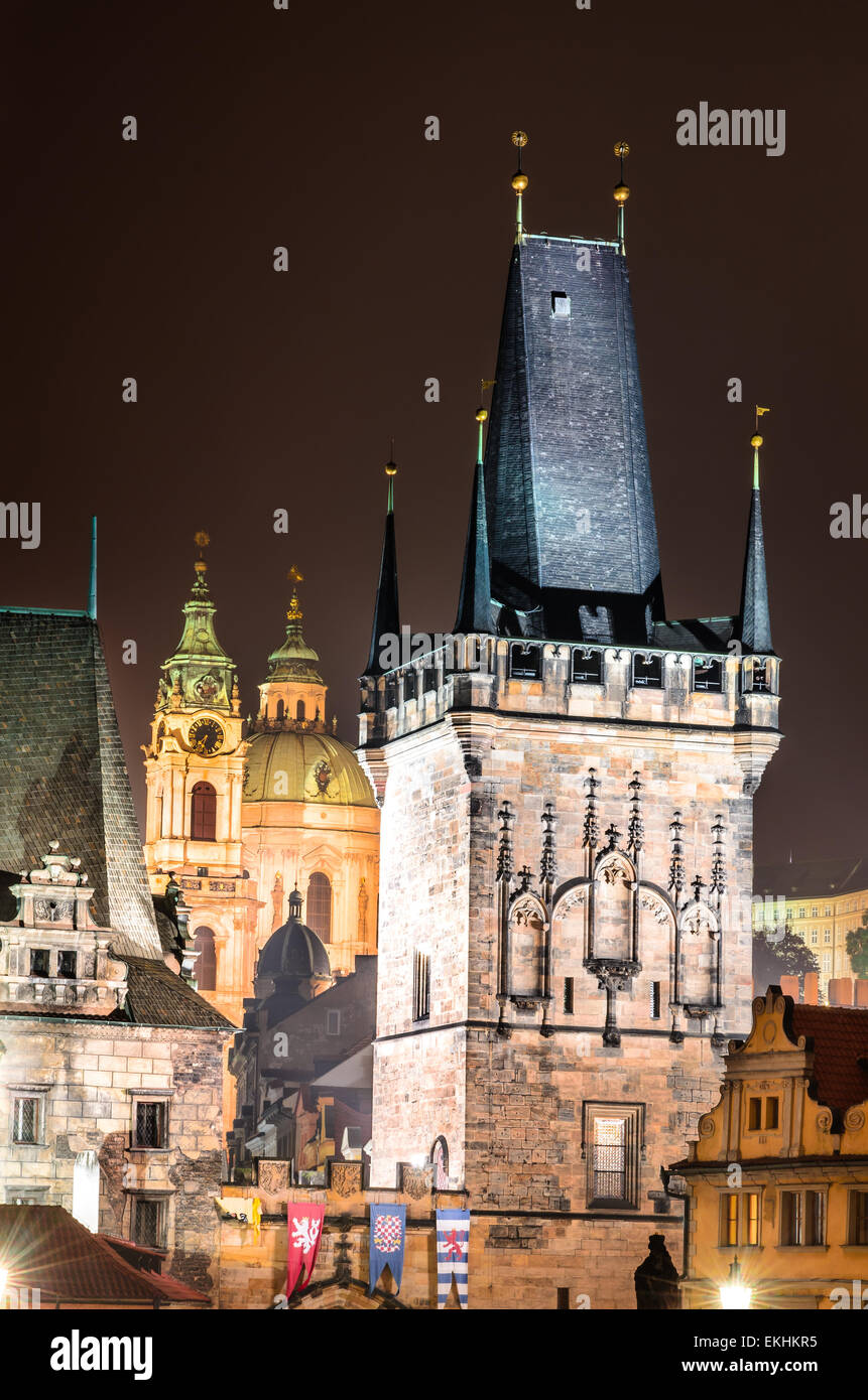 Charles Bridge with Mala Strana and Judith towers, Prague symbols joining historic quarters of Stare Mesto and Mala Strana. Stock Photo