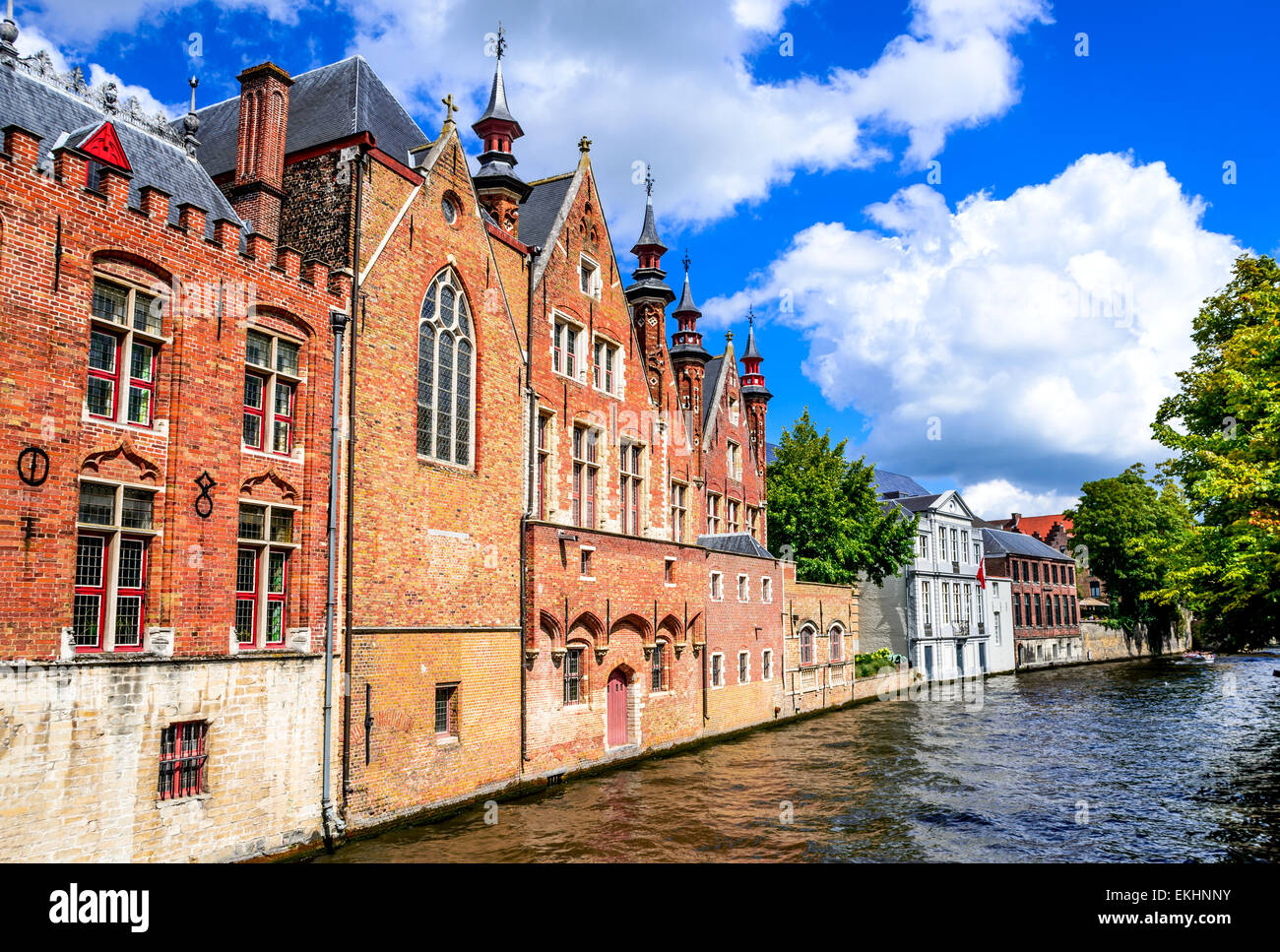 Bruges, Belgium. Summer scenery with gothic style houses and Groenerei water canal in Flanders medieval city of Brugge. Stock Photo