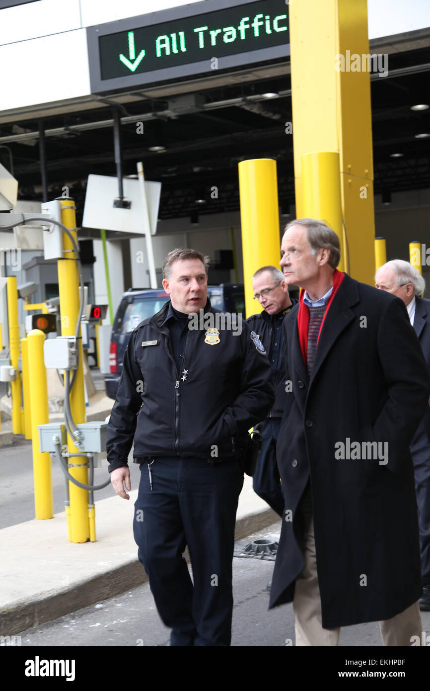 040213: Director of Field Operations (DFO) Christopher Perry briefs Homeland Security and Governmental Affairs Committee (HSGAC) Chairman Senator Tom Carper and Senator Carl Levin on operations during a walking tour of the Detroit-Windsor Tunnel Port of Entry.  : Kris Grogan Stock Photo