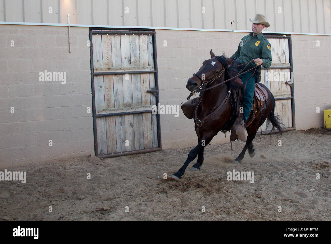 CBP, Border Patrol agent from the Laredo Horse Patrol unit on patrol on