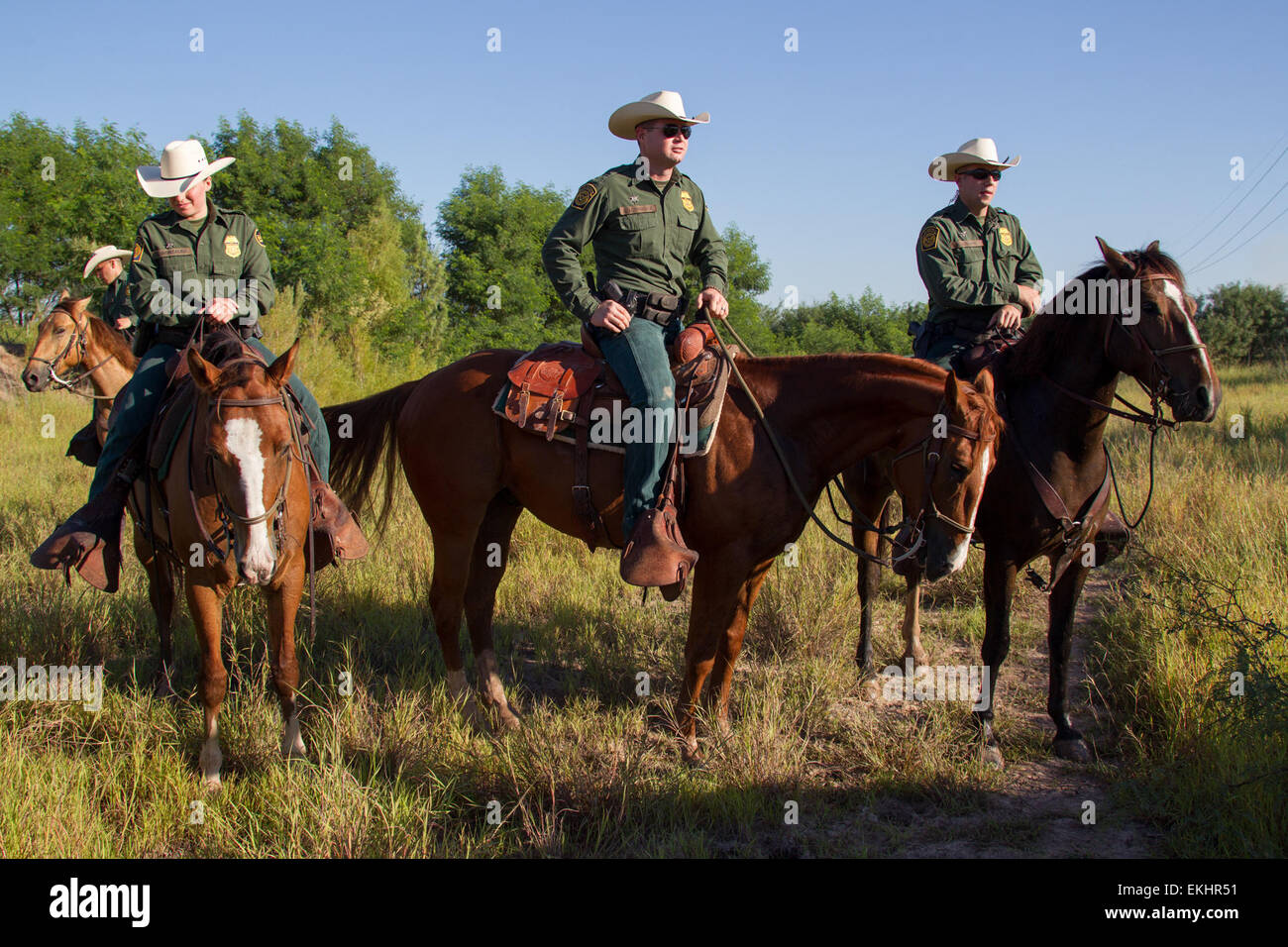 CBP, Border Patrol agents from the McAllen station horse patrol unit on patrol on horseback in