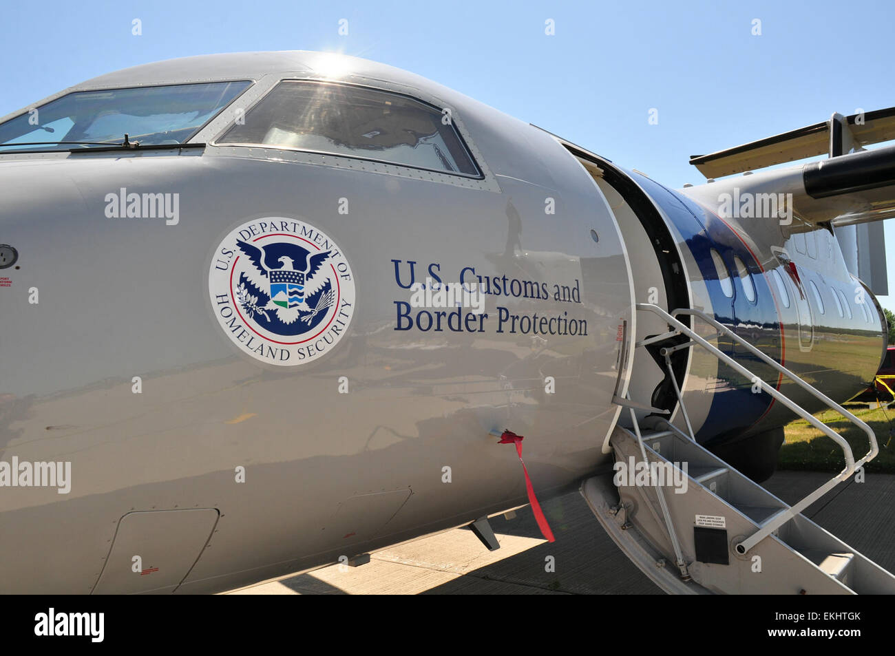 U.S. Customs &amp; Border Protection Air &amp; Marine Dash 8 was open for tours at EAA AirVenture 2011.  Brian Bell Stock Photo