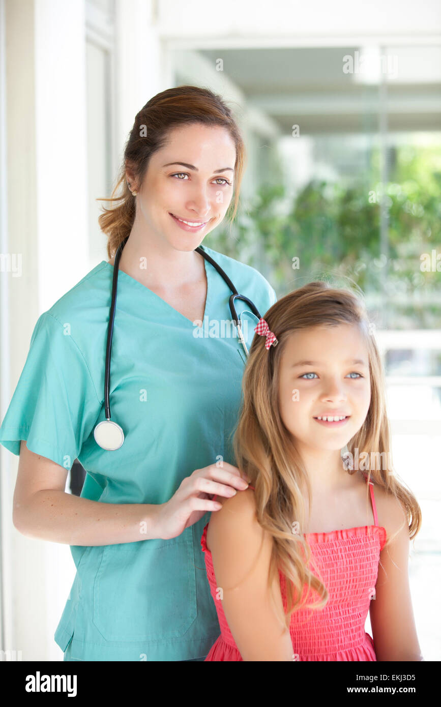 Pediatrician with her patient Stock Photo