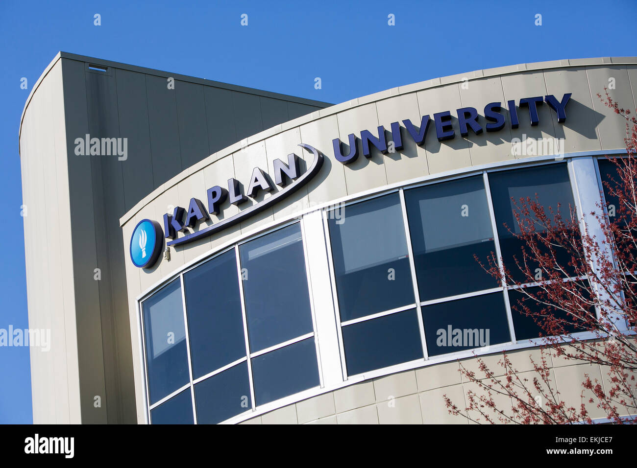 A logo sign on a building occupied by Kaplan University Stock Photo Alamy