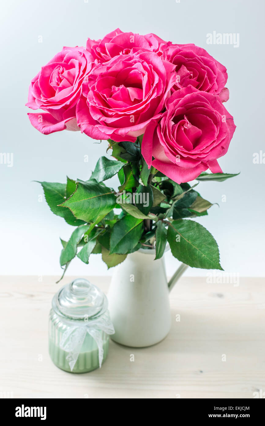Bouquet of beautiful pink roses on white background Stock Photo - Alamy