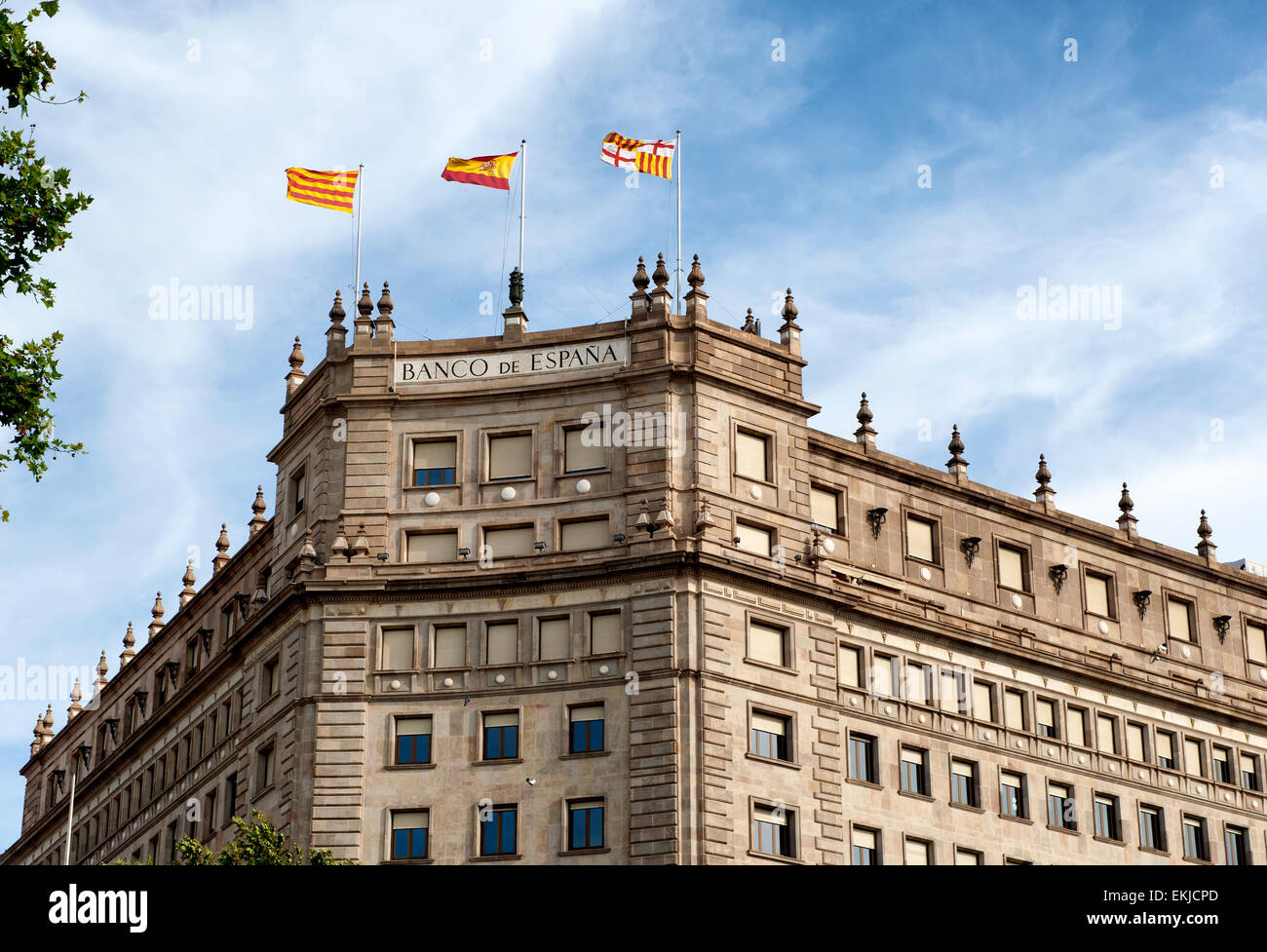 Office of Spanish bank Banco de España in Barcelona city centre, Spain, against a blue sky Stock Photo