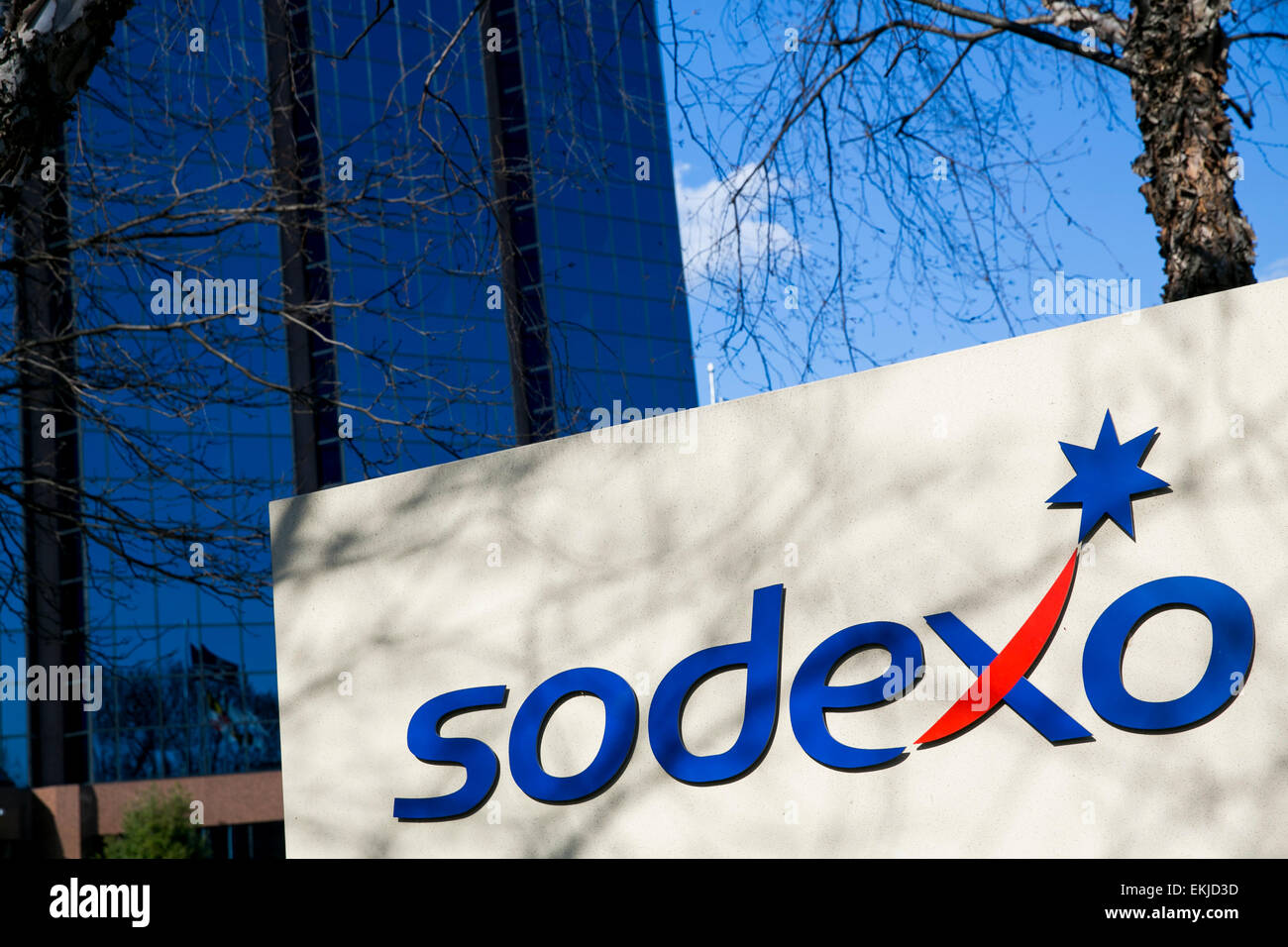 A logo sign outside the U.S. headquarters of Sodexo. Stock Photo