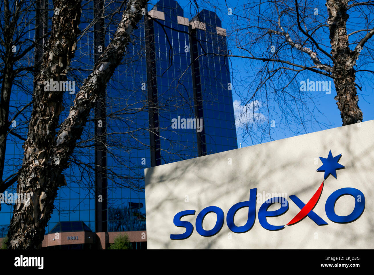 A logo sign outside the U.S. headquarters of Sodexo. Stock Photo