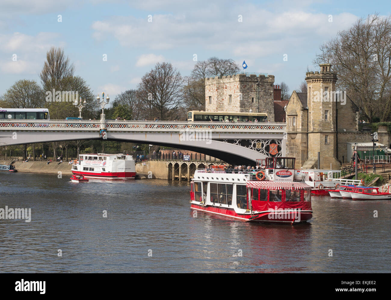Yorkboat River Palace passing under Lendal bridge, City of York, England, UK Stock Photo