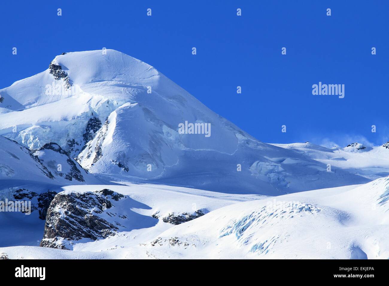 Allalinhorn mountain view from Saas Fee at dawn, Switzerland Stock Photo
