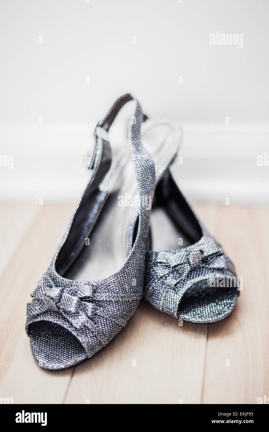 Crossed Silver Flat Woman Shoes with Strap Stock Photo