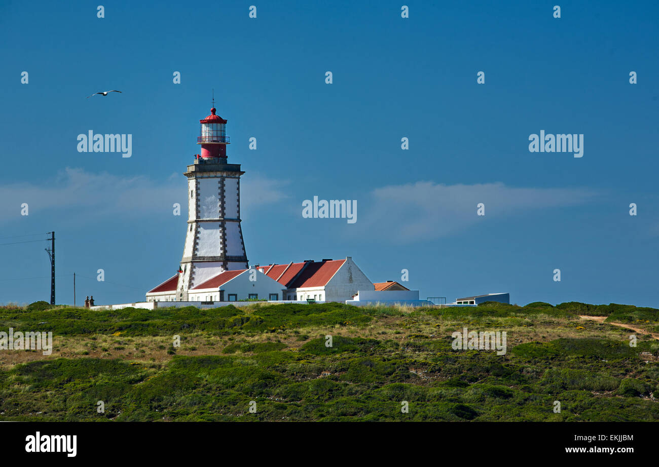 Espichel cape. View of green fields arround the lighthouse, Sesimbra Portugal Stock Photo