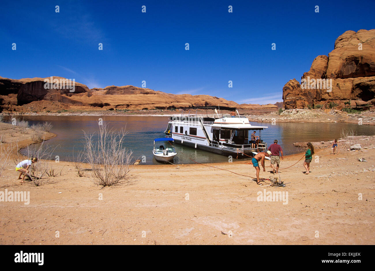 Houseboat anchors must be set ashore not in the water, Lake Powell, Utah, USA Stock Photo Alamy