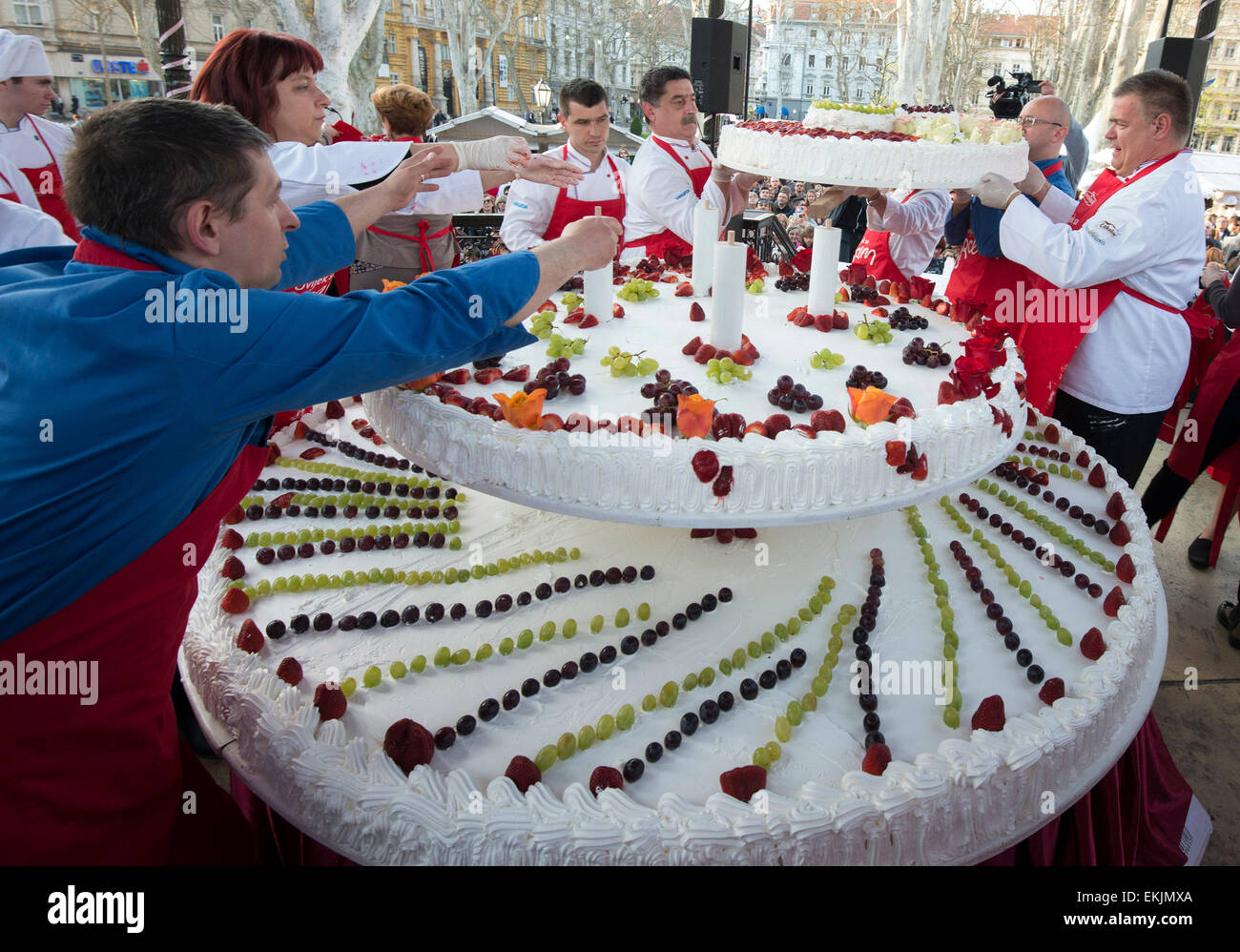 Zagreb, Croatia. 10th Apr, 2015. Chefs decorate a large cake during the