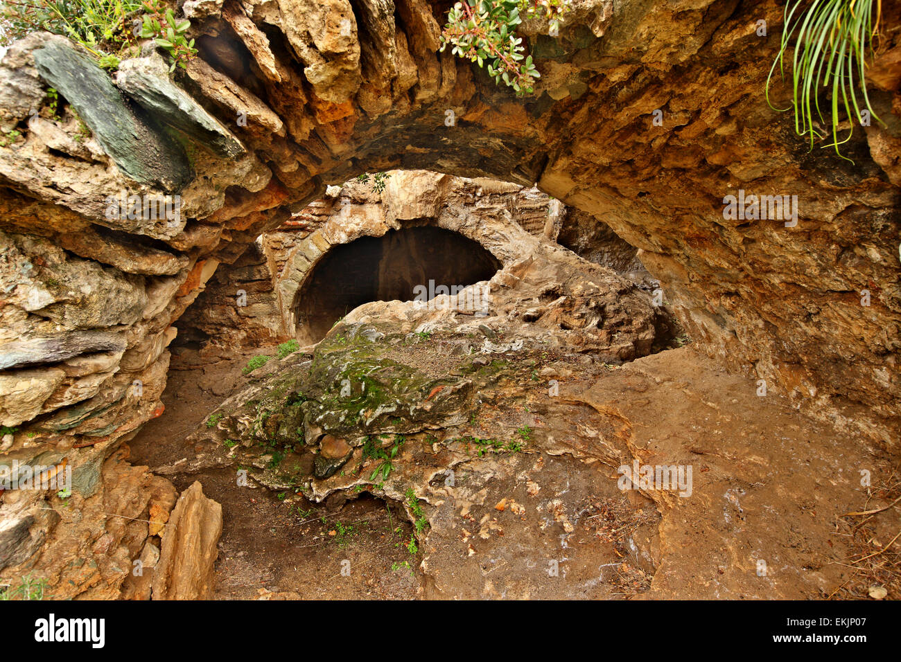 The 'Cave of Syllas' ancient (Roman) bath  at Edipsos ('Aidipsos') town, North Evia ('Euboea') island, Greece. Stock Photo