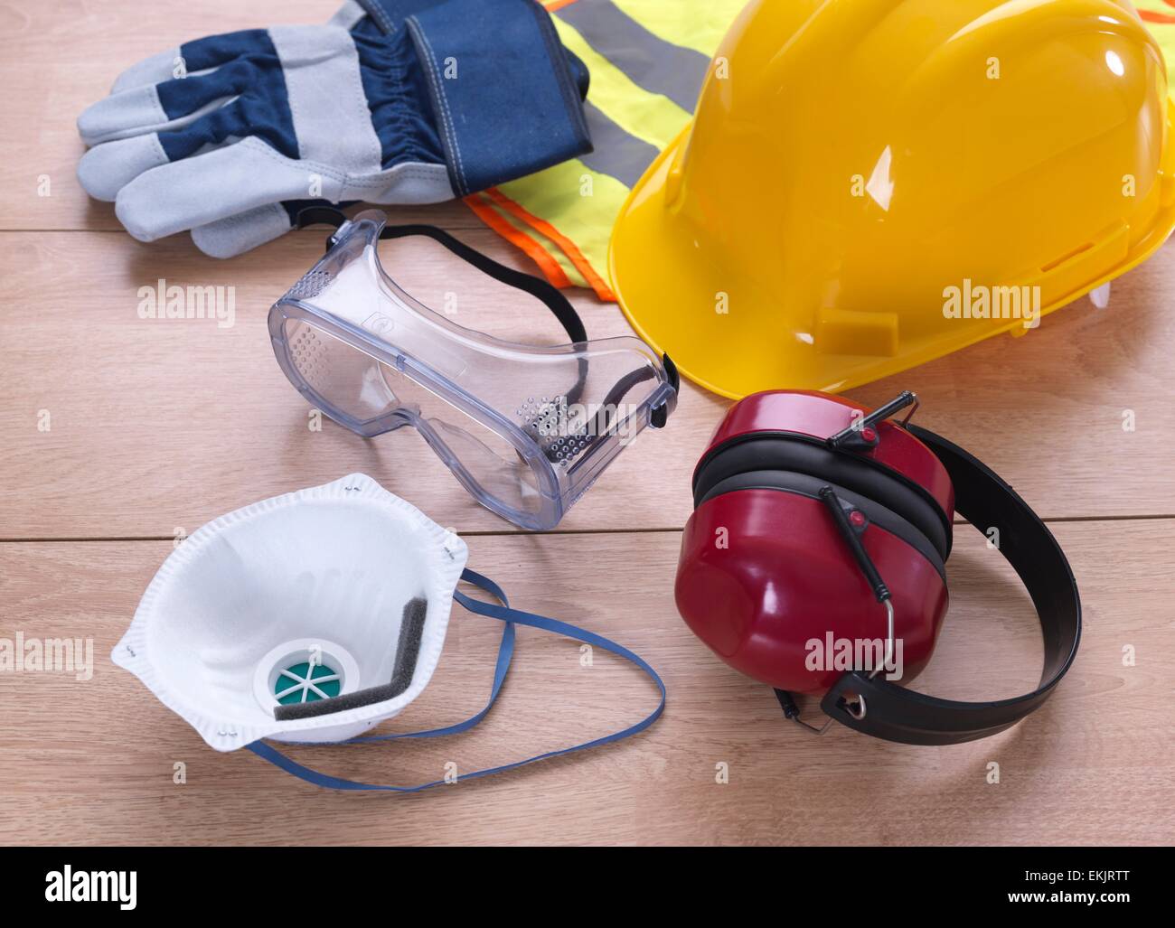 mask, construction, ear defenders, equipment, eye wear, face mask, fluorescent vest, glasses, gloves, hard hat, health and safety, high visibility vest, protective eyewear, safety glasses, safety helmet, small group of objects, studio shot, tabard, valved Stock Photo