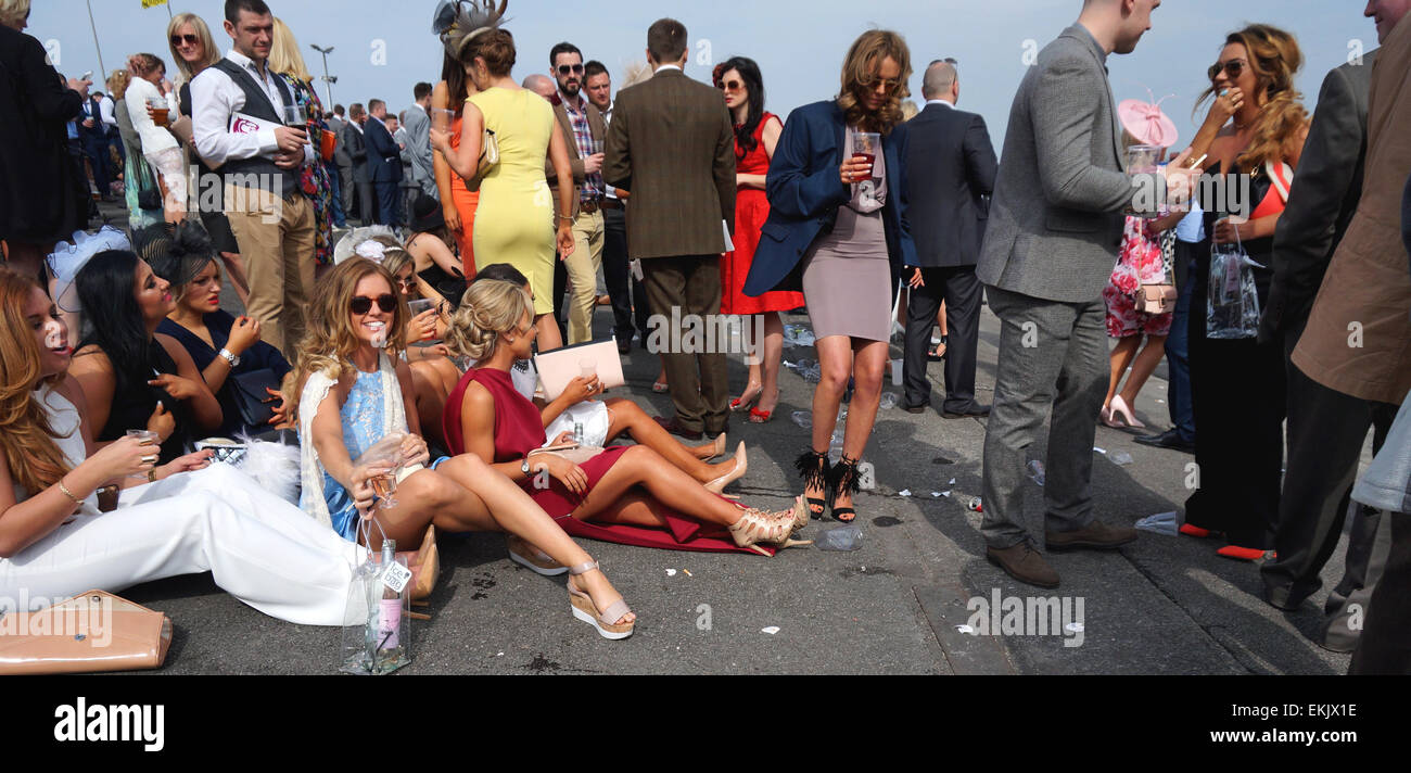 Liverpool, UK. 10th Apr, 2015. Racegoers enjoy Ladies Day At Aintree - Crabbie's Grand National 2015. The sunshine on Friday attracted a large crowd of spectators dressed up to the nines at this year's colourful event which took place on Friday afternoon April 10th,2015 in Liverpool, UK. Credit:  Pak Hung Chan/Alamy Live News Stock Photo
