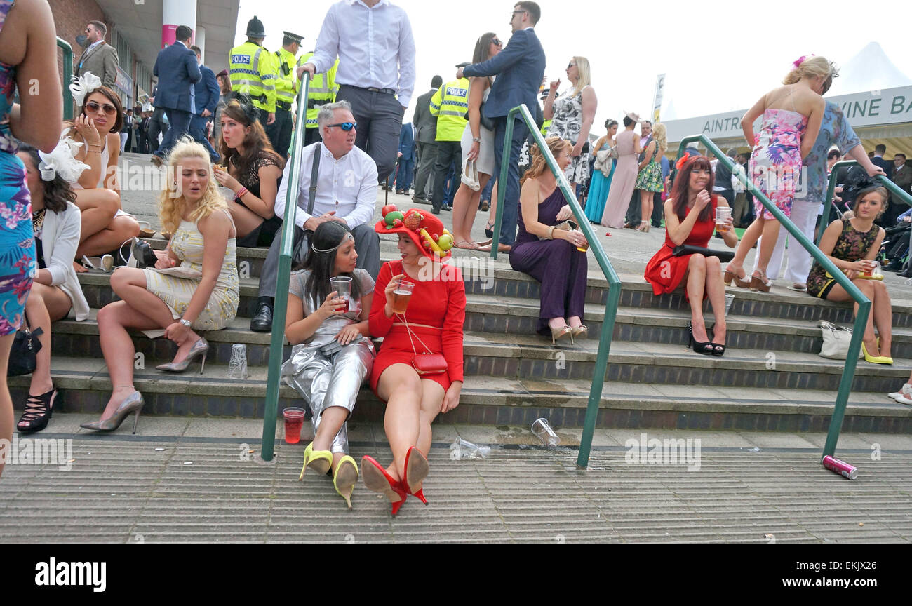 Liverpool, UK. 10th Apr, 2015. Racegoers enjoy Ladies Day At Aintree - Crabbie's Grand National 2015. The sunshine on Friday attracted a large crowd of spectators dressed up to the nines at this year's colourful event which took place on Friday afternoon April 10th,2015 in Liverpool, UK. Credit:  Pak Hung Chan/Alamy Live News Stock Photo