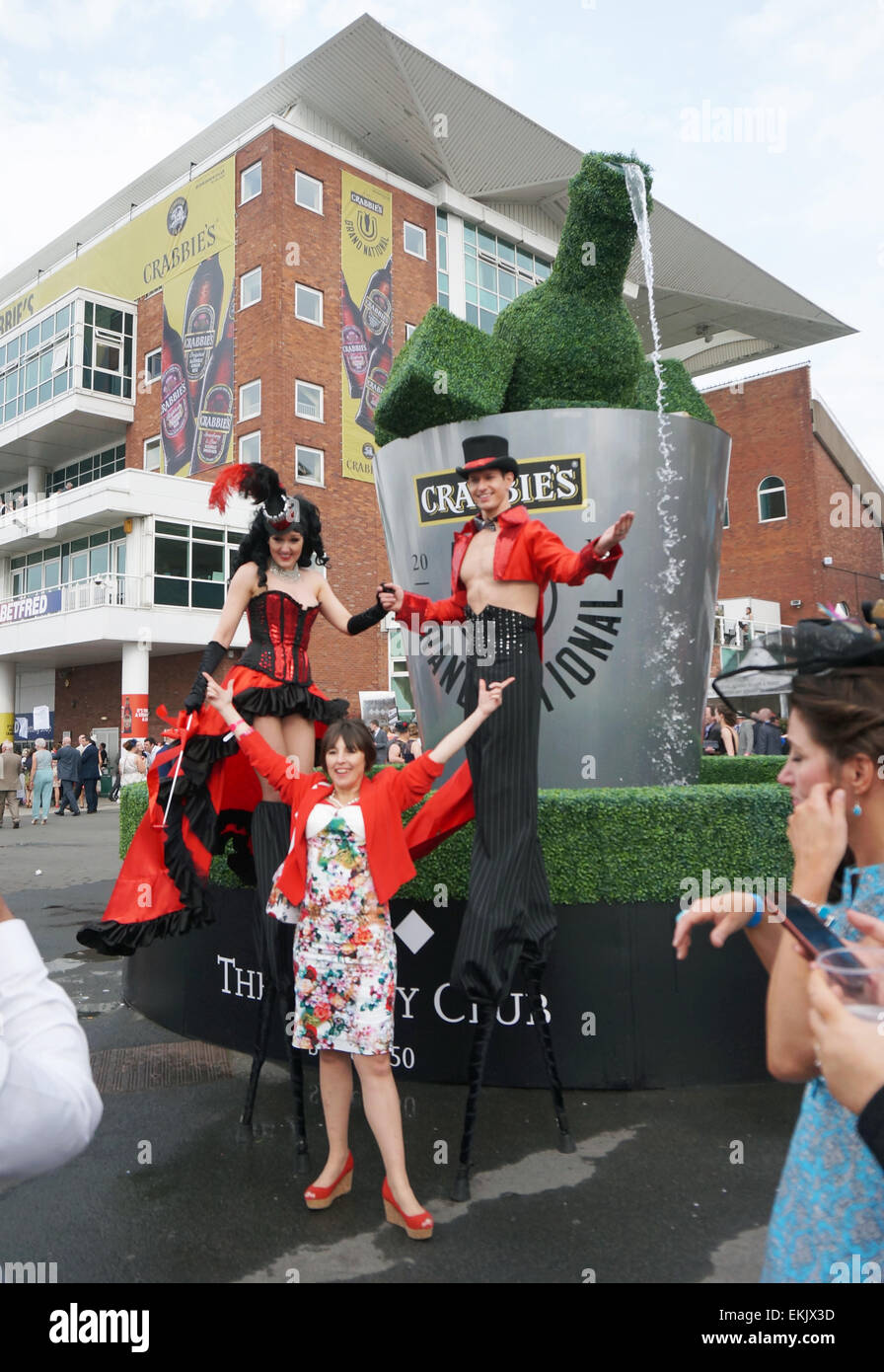 Liverpool, UK. 10th Apr, 2015. Racegoers enjoy Ladies Day At Aintree - Crabbie's Grand National 2015. The sunshine on Friday attracted a large crowd of spectators dressed up to the nines at this year's colourful event which took place on Friday afternoon April 10th,2015 in Liverpool, UK. Credit:  Pak Hung Chan/Alamy Live News Stock Photo