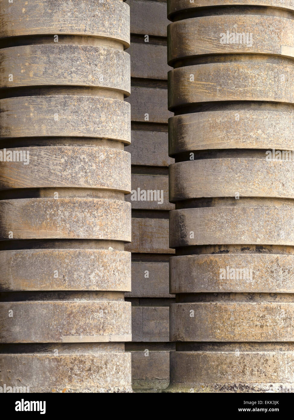 Massive rusticated round stone Doric columns at Grimsthorpe Castle, Bourne, Lincolnshire, England, UK. Stock Photo