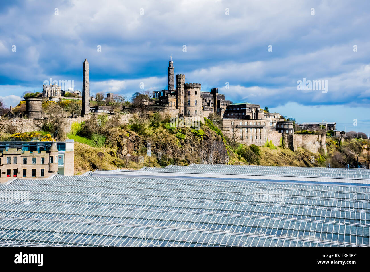 View towards Calton Hill in Edinburgh, Scotland over the large glazed roof of Waverley Railway Station Stock Photo